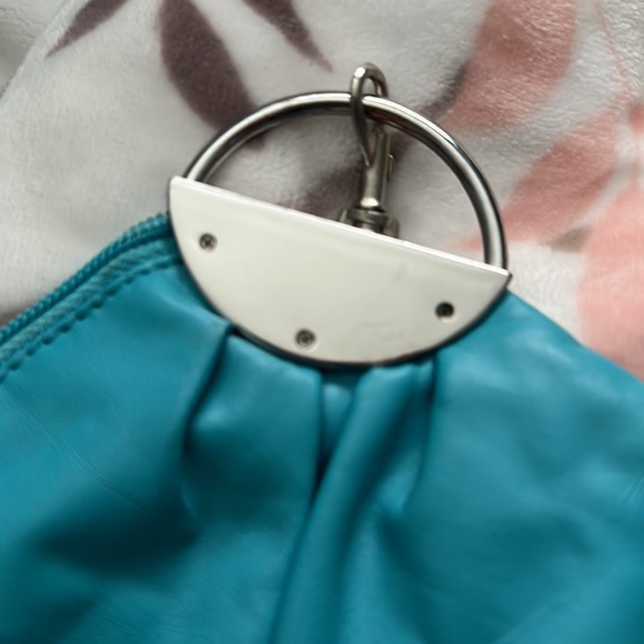 Turquoise Coin Pouch (Vinyl type Material) Interior has a zipper pouch area - Picture 10 of 11